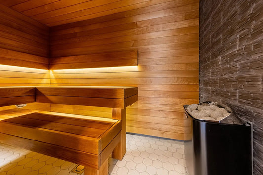 Banc de sauna en bois avec seau