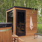 Sauna extérieur Nordic Dawn avec porte en verre et bancs en bois.