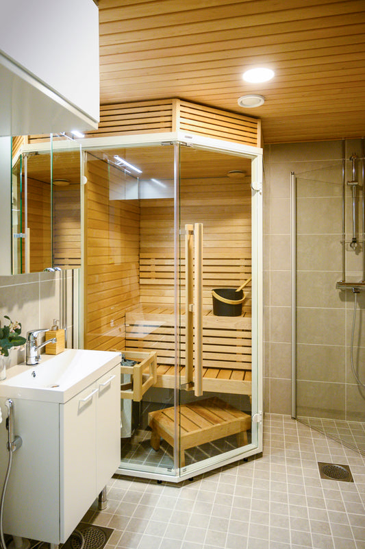 Sirius Sauna d'angle avec lavabo et banc en bois.