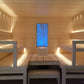 Cariitti Linear LED 2m installé dans un sauna avec des bancs en bois.