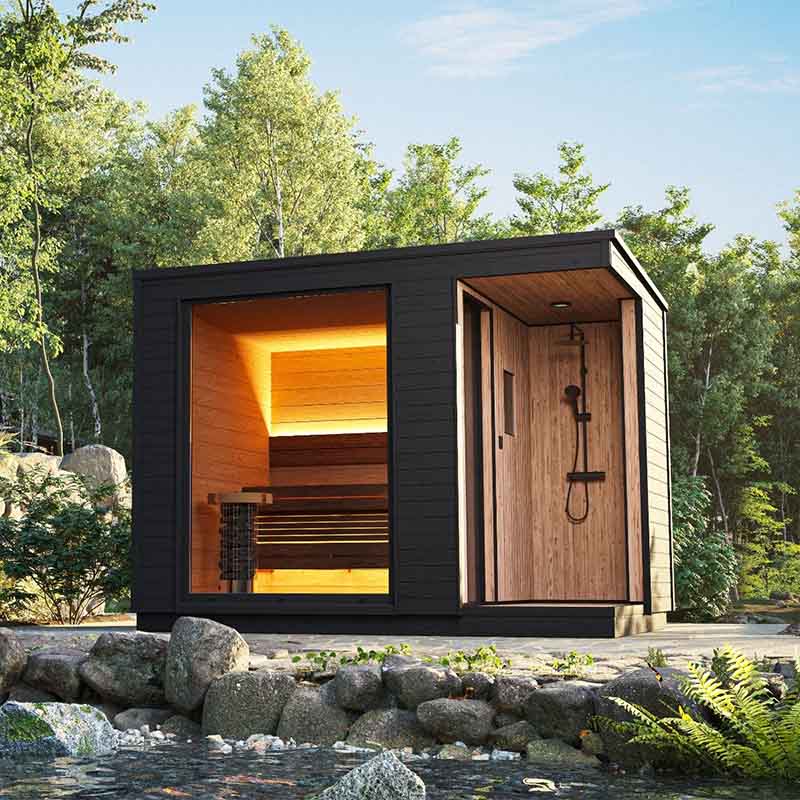 KUUT Sauna électrique extérieur avec douche près de la rivière.